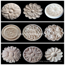 Wood carved rosettes